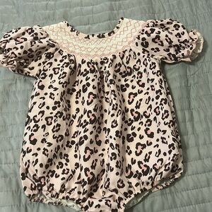 Pink animal print Romper with smocking!